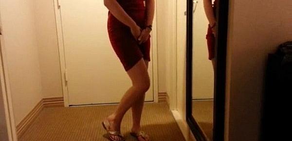  nice girl in dress wets herself